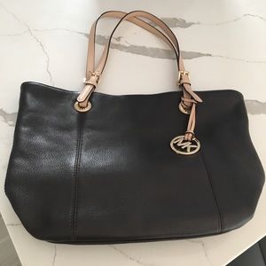 Michael Kors purse 11” tall x 17” wide at the top